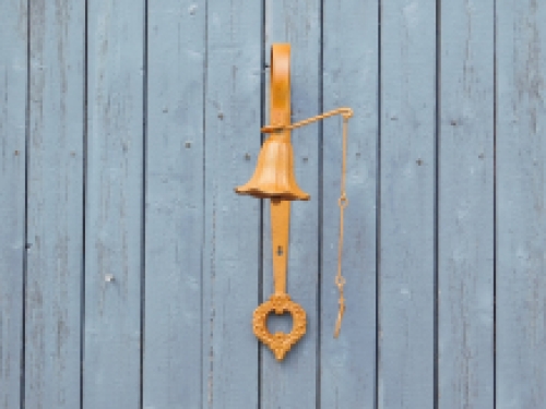 Cast iron wall bell - with wreath - rust colour - retro design