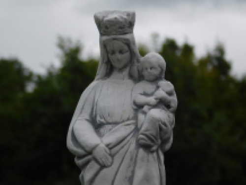 Mary with child in her arm, full of stone, untreated