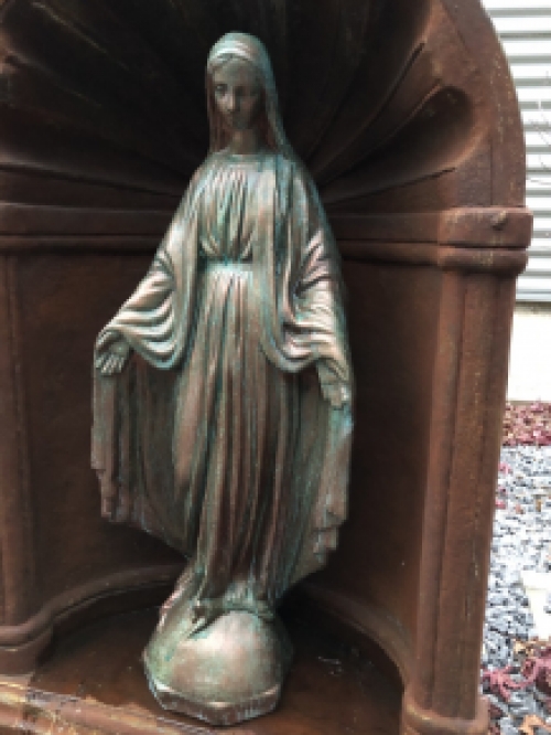 Beautiful statue of Mary with a stone-copper finish