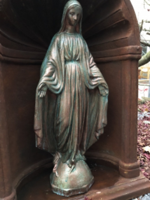 Beautiful statue of Mary with a stone-copper finish