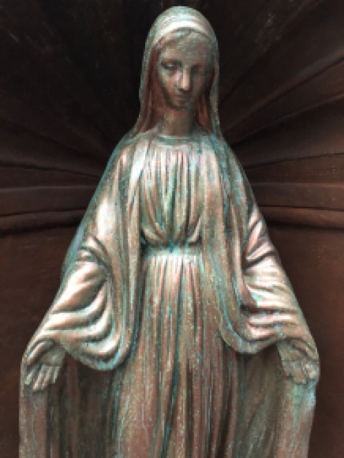 Beautiful statue of Mary with a stone-copper finish