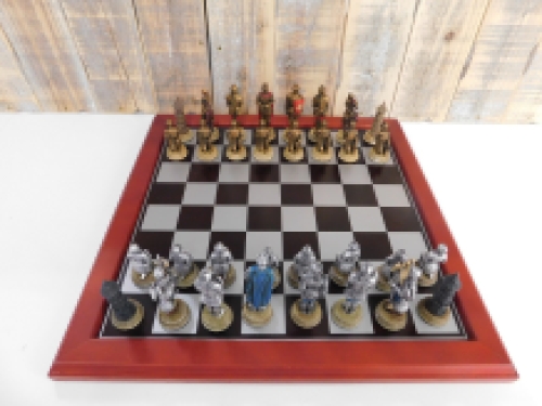 A chess game with the theme: ''MEDIEVAL KNIGHTS'', beautiful chess pieces as medieval knights