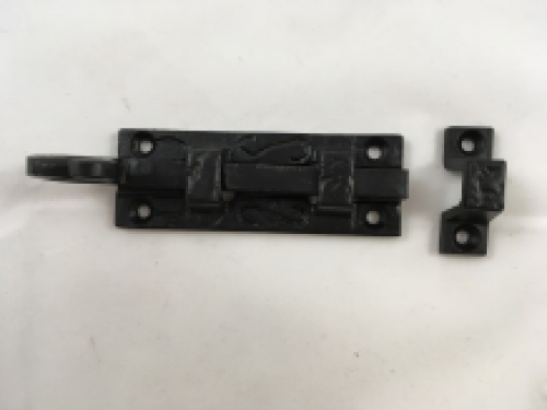 A beautiful door latch / slide lock, matte black, made of wrought iron