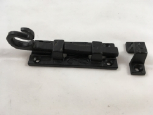 A beautiful door latch / slide lock, matte black, made of wrought iron