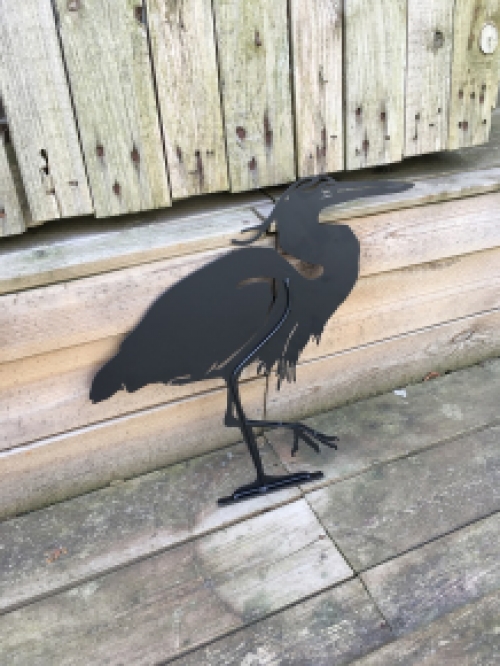 Prachtig silhouette van een reiger, mat zwart metaal