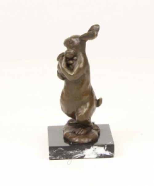 A bronze statue/sculpture of a rabbit with a cub