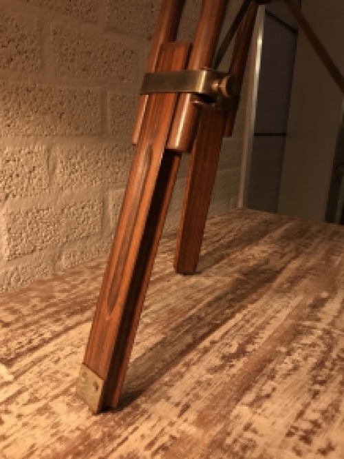 Beautiful decorative telescope on a wooden tripod