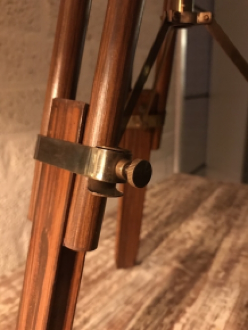 Beautiful decorative telescope on a wooden tripod