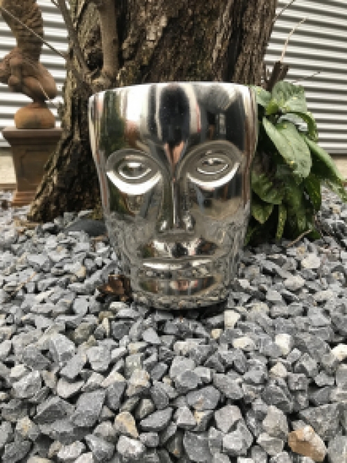 Beautiful aluminum vase, round in the shape of a face, nickel