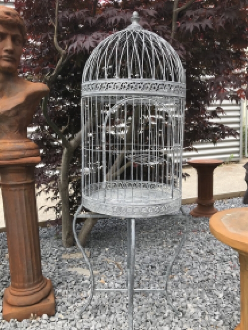 A very pretty decorative birdcage made of iron